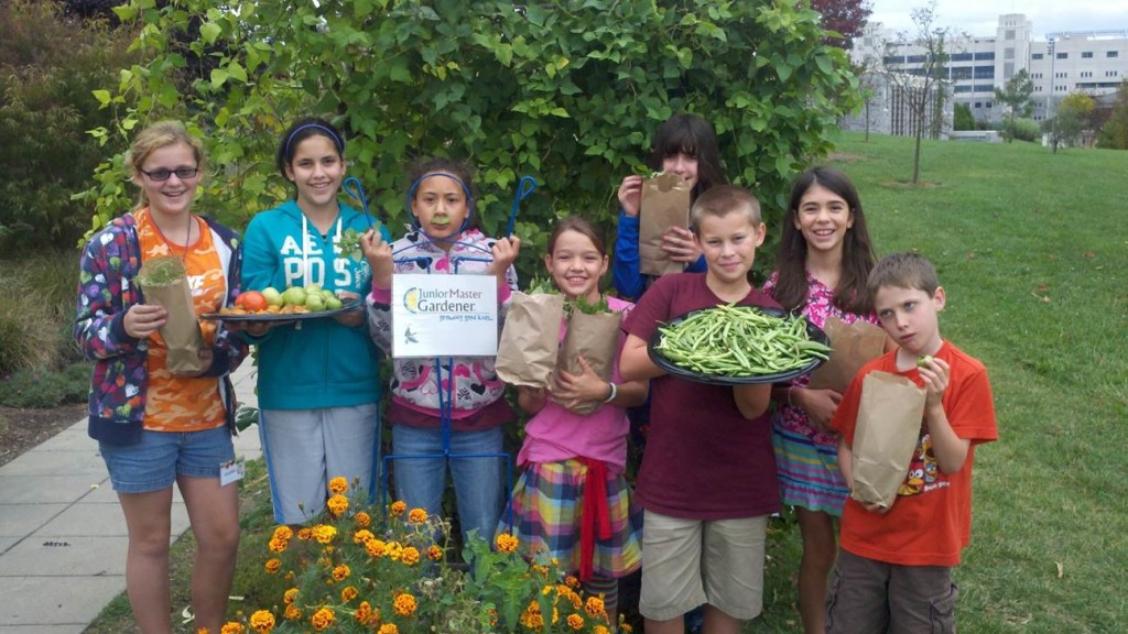 JMG kids in Virginia showing off their harvested plants!